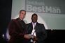 Livingstone Maluleke receives his award for Best Man - Public Service