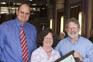 Marius Kilian (RMB Private Bank) and Outstanding Outlet winners Lynne and John Ford