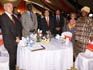 Guests stand for Kenya's national anthem