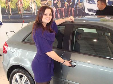 Two winners celebrate their win after V&A Waterfront AUDI13 draw