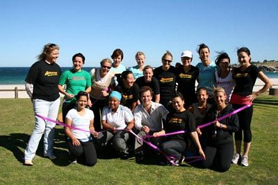 Adventure Boot Camp at Camps Bay and Derek Van Dam celebrate the funds raised in support of Breast Cancer