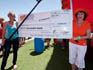Liqui-Fruit brand manager, Karen Veysey, hands over the R50 000 cheque to grand prize winner, Linda Lloyd, from Houtbay.
