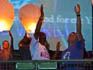 Jacaranda 94.2 presenters Maurice Carpede and Robbie Kruse releasing the lanterns for Earth Hour