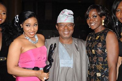 Chairman of Airtel Nigeria, Dr. Oba Otudeko (CFR) flanked by the winner of the Best Actress in the leading Role award, Rita Dominic (left) and actress, Kate Henshaw.