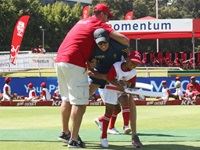 Graeme Smith and Morne Morkel have some fun with Lucien Valentine during the game between the KFC Mini-Cricket kids and the Proteas at Sahara Park Newlands.