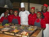 Image 2 - Head chef Brighton Nekatambe (centre) and The Boma - Dinner & Drum Show culinary team