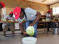 Picture 1- Soul Ambassadors wash and chop Cabbages