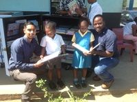 Novus management handover the Libraries at the school with the delighted learners.