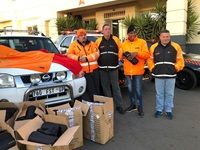 Tow truck drivers use their 67 minutes to distribute blankets